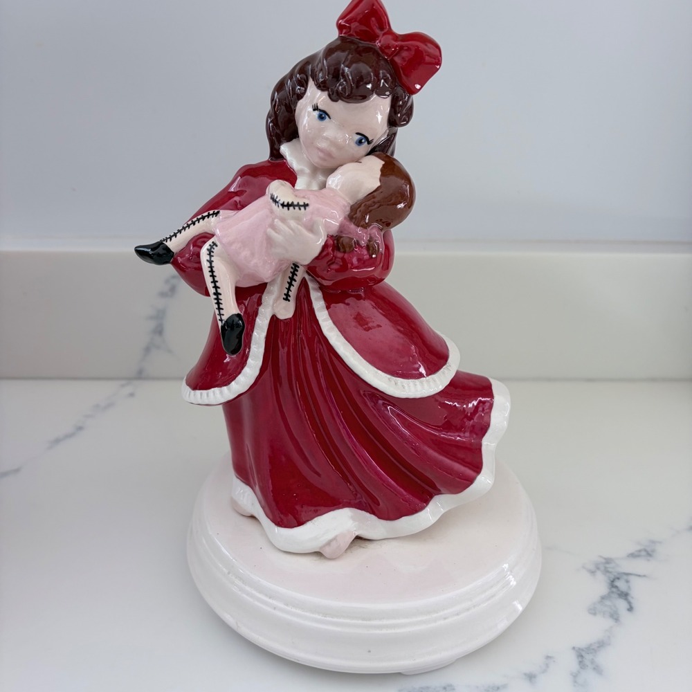 Vintage Sankyo Japan Ceramic Music Box Girl with Rag Doll Red Dress Figurine